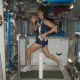 NASA astronaut Sunita Williams uses a bungee harness to exercise on the Combined Operational Load Bearing External Resistance Treadmill (COLBERT) on the International Space Station in 2012. (Photo credit: NASA)