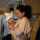 Liliya with baby Micaela, three days after separation surgery.