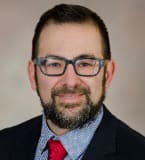  Eric Simpson M.D., M.C.R. 