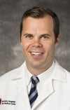 James E. Voos, MD