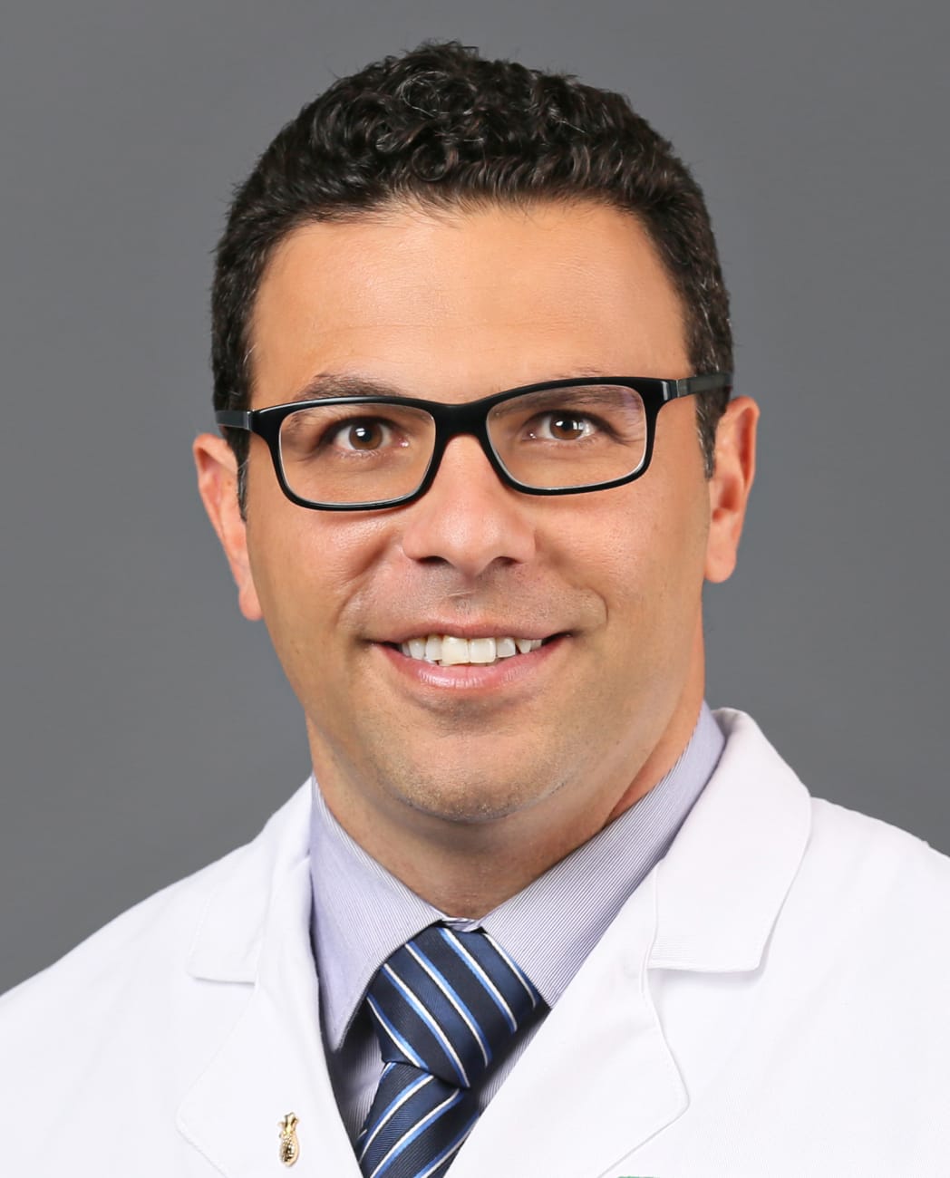  Dr”. Elias width=“50