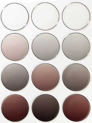 The ULP single-vision and progressive lenses revealing various stages of Transitions Signature VII (brown) lens darkness
Photo: David Kressler