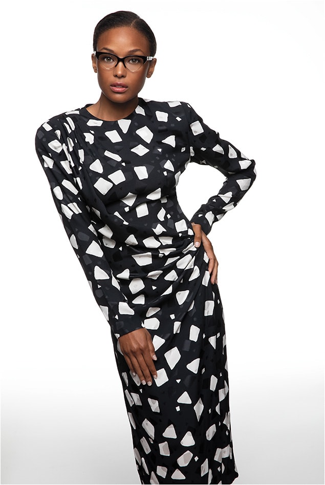 RETRO MUSINGS
The Marc Jacobs MARC314 from Safilo boasts a distinctive vintage-feel cat-eye look in chunky acetate with metal accents.
Dress courtesy
Marc Jacobs