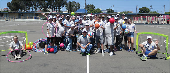 ZEISS president Jens Boy (in goal, right) with the ZEISS team during a day of volunteering at the Perkins K-8 School in San Diego