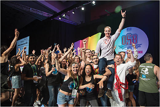 Winner Taylor Harris is lifted by his Illinois College of Optometry teammates during the Essilor Optometry Student Bowl