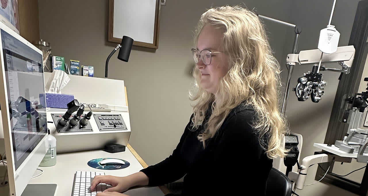 Student working in clinic.