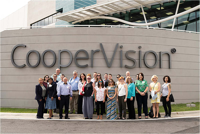 CooperVision representatives and their guests shown outside the company’s Alajuela, Costa Rica, manufacturing facility.