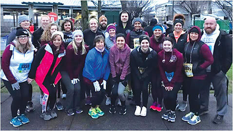 A group from Dr. Reynoldson’s clinic, including staff, patients, and friends, attended the Hot Chocolate 5K together.Photo courtesy of Dr. Reynoldson.