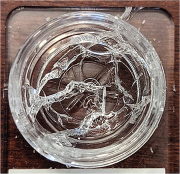 Figure 8. Plastic diagnostic lens case that cracked after extended exposure to 3% ophthalmic hydrogen peroxide solution.