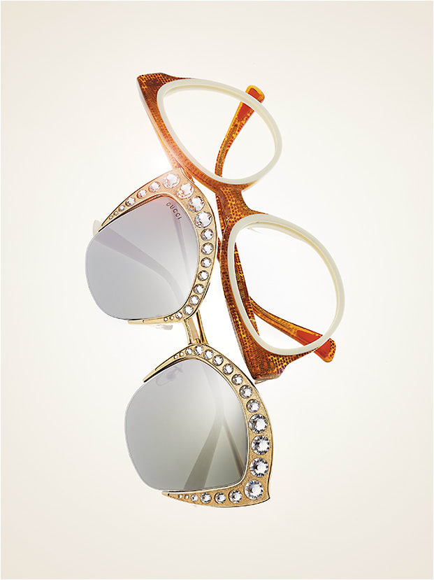 GLAM, AMPED UP 
(from left): 
Gucci sunglass style GG0114S from Kering offers a metal cat-eye construct topped with Swarovski crystals. 
Christian Roth style Kiss Me Kate blends embedded glitter + chic ivory in its signature cut-and-paste technique.