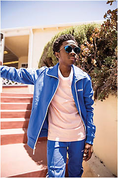 THRILLING STYLE Caleb McLaughlin, a star in the Netflix-original series “Stranger Things,” poses in Police style SPL496 from De Rigo REM. Season Two of the celebrated science fiction series debuted last month. Photo: Courtesy of STATUS