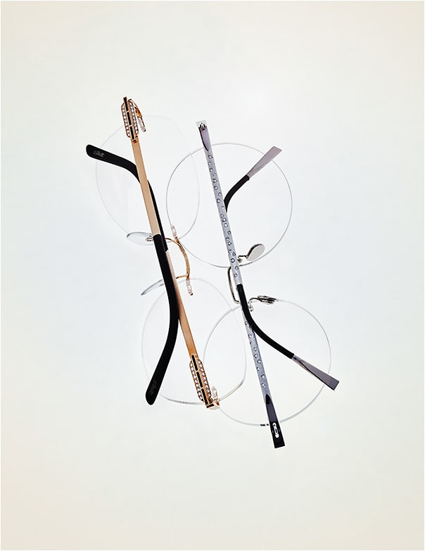 SOLID, WITH A SIDE OF DIAMONDS 
(from left): 
Silhouette Atelier Collection model Pure Déco G016/AP is crafted of 18-karat solid gold and features six onyx stones and 36 brilliant-cut diamonds. 
Lindberg style Spirit T932 displays solid white gold in a silk finish and diamonds with an on-trend round lens shape (model 2271).