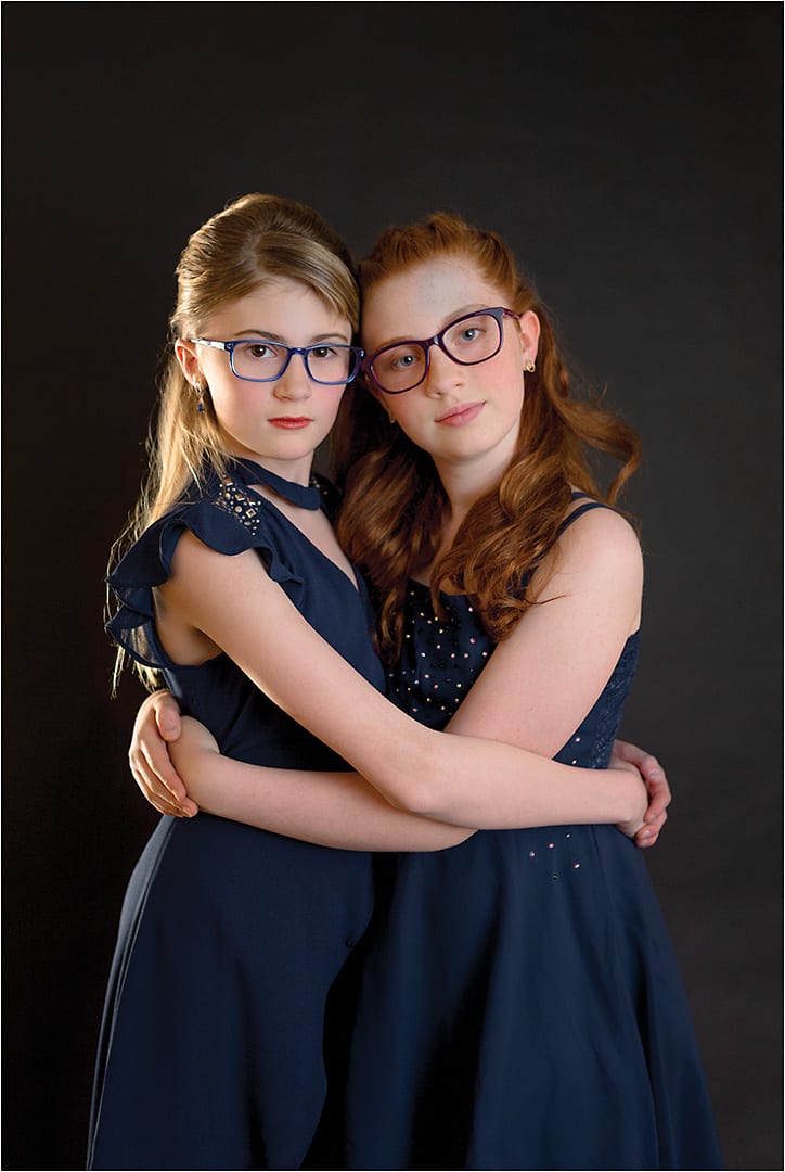 BLUE NOTE
On Mia (left): The Steve Madden Resstless in blue from ClearVision Optical is a modern rectangle acetate that picks up the light. On Zada (right): The Converse K407 from De Rigo REM offers a modified rectangular silhouette in three layers of acetate in purple/pink and a star print detail on the temples.