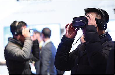 Attendees try out the latest in virtual reality technology