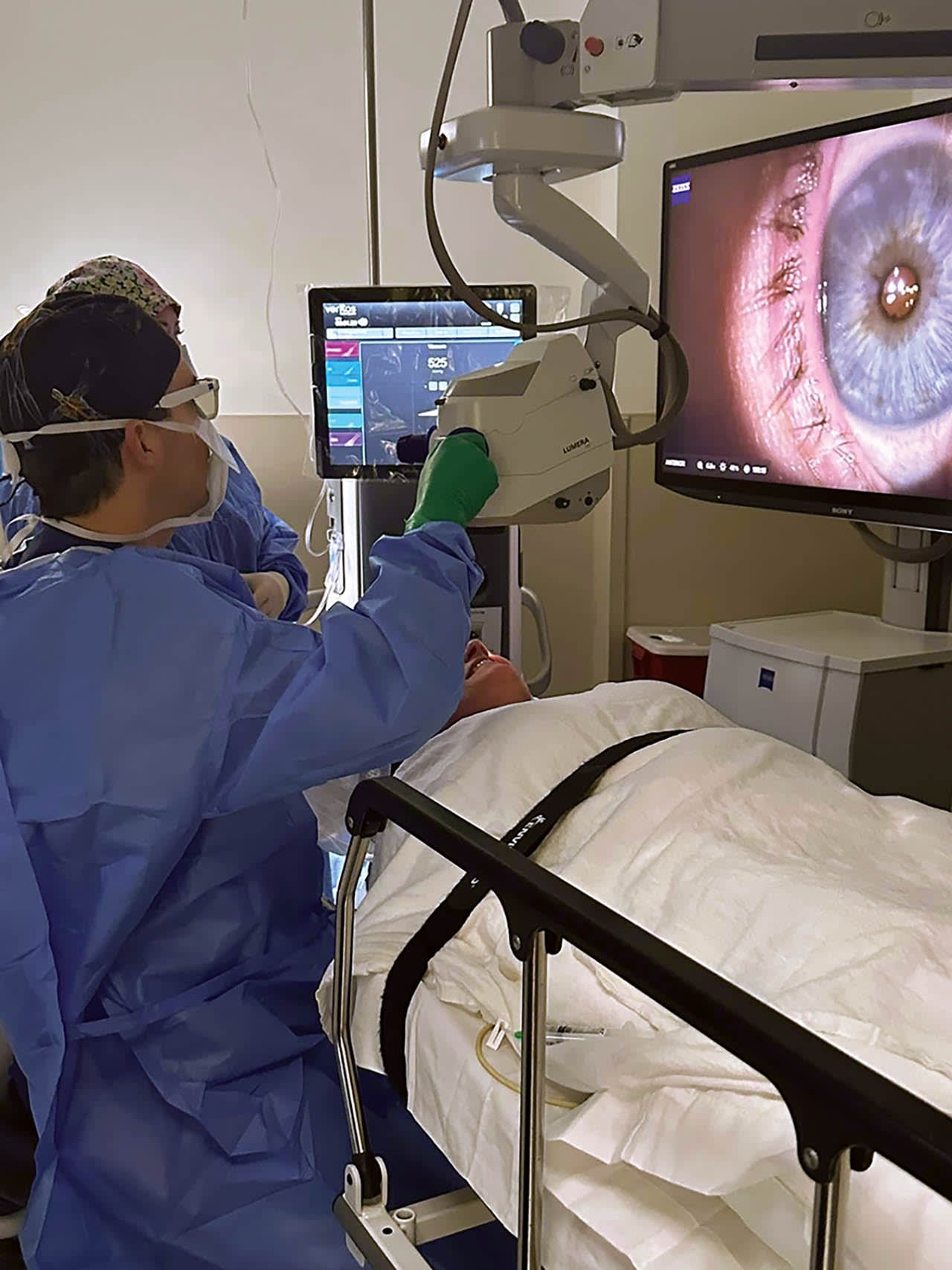 Dr. Taylor Strange, chief surgeon, at Alliance Vision Institute, prepares a patient for surgical implantation of the Light Adjustable Lens at Precision Ambulatory Surgery Center, using Lumera technology from Zeiss for advancing vision correction.