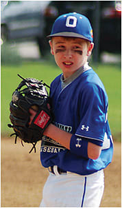 Dr. Miller’s son playing baseball. 
Photo courtesy of Dr. Jason Miller