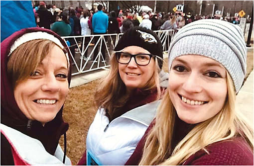 Practice staff, including optician Sue Douglas, receptionist/tech Mary Denison, and optician Nikki Sutton, attended the Hot Chocolate 5K together in order to create a shared team experience. Photo courtesy of Dr. Reynoldson.