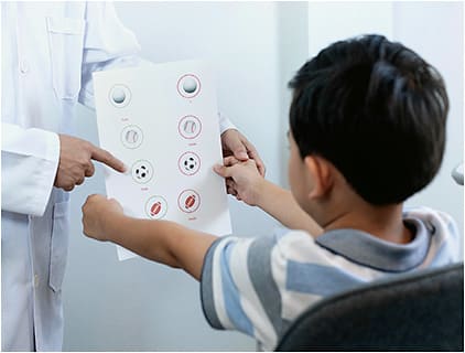 A child undergoing binocular vision therapy.