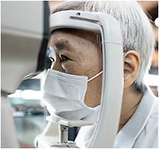 A flat, surgical-type or thin cloth mask is less likely to interfere with the IOP reading. Satjawat/stock.adobe.com