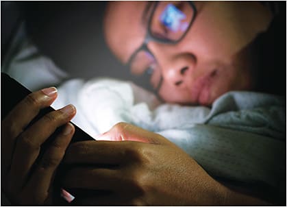 Digital device use has been implicated in circadian rhythm disruption. Photo Sesaon/stock.adobe.com