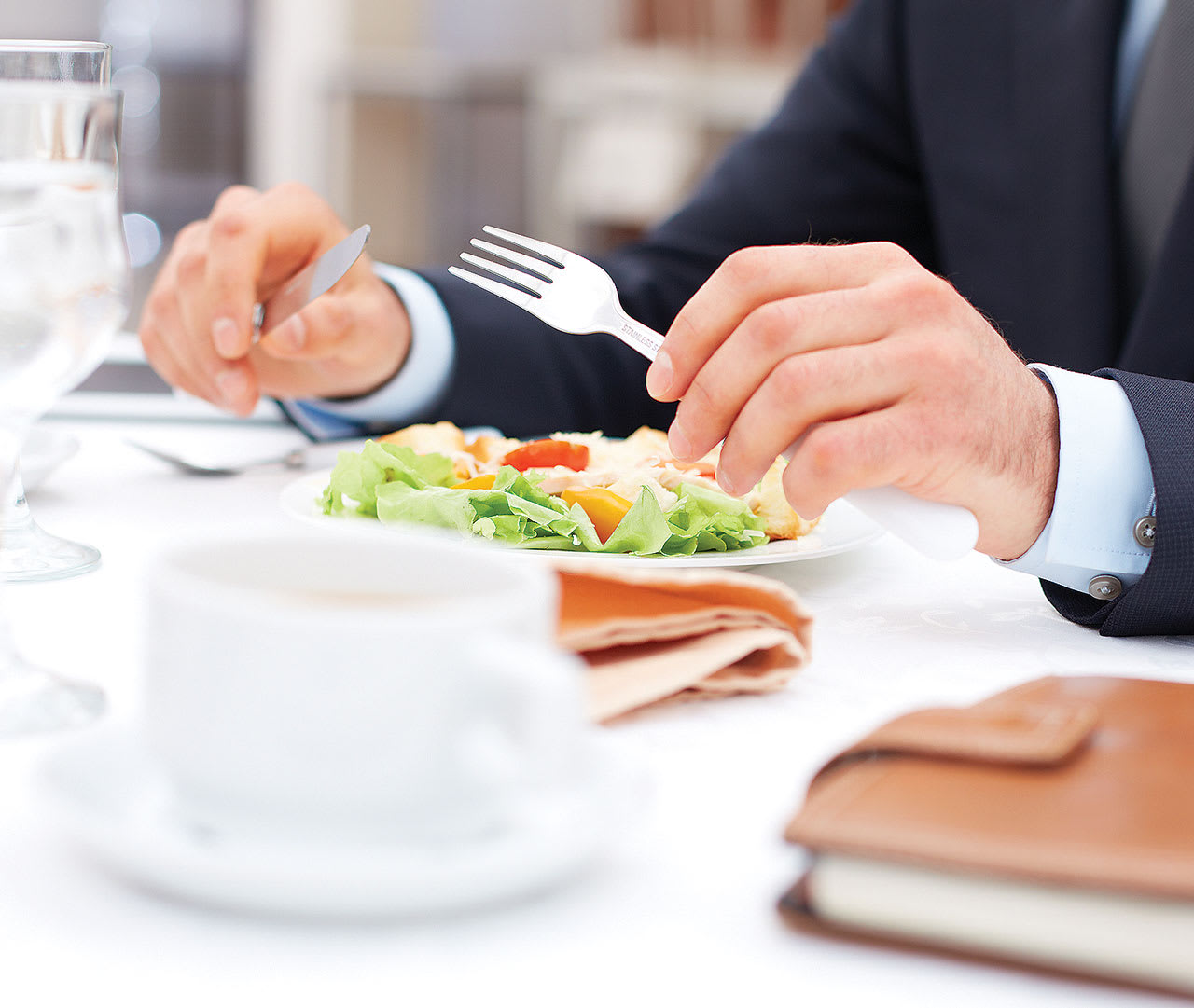 To get a better understanding of the associate candidate’s personality, consider interacting with them in a casual setting, such as at a meal together. (Photo courtesy: AdobeStock/pressmaster)