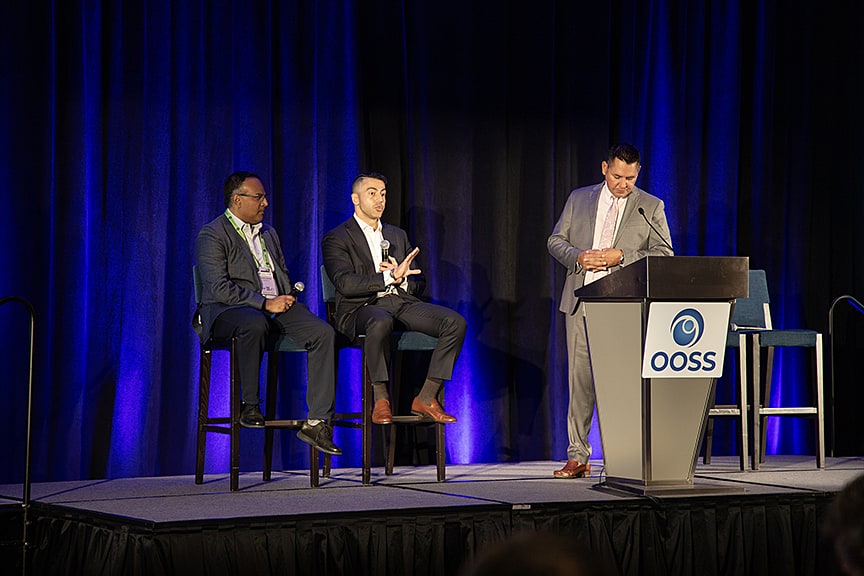 <p><strong>Figure 1. </strong>Ashkan Abbey, MD, (center) speaks during the Innovation in Retina in the ASC program, part of OOSS’s 2025 symposium in Orlando, Florida. Joining him on stage were Vishak John, MD, (left) and moderator Albert Castillo, MBA.</p>