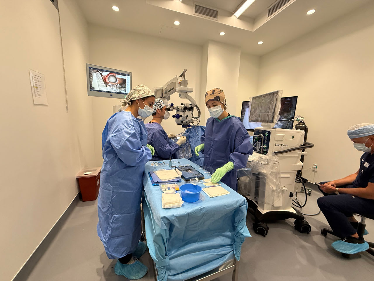 The NYC Retina surgical team, Victoria, Dayanna and Dr. Feistmann, perform surgery in the practice's office-based surgery suite.