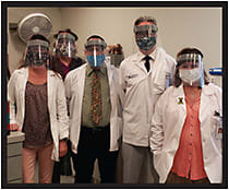 From left: Christel Unger, Rick Dull, Kurt Warren, James Mulligan, and Kim Houser in the optical lab at the Cleona, PA, location.