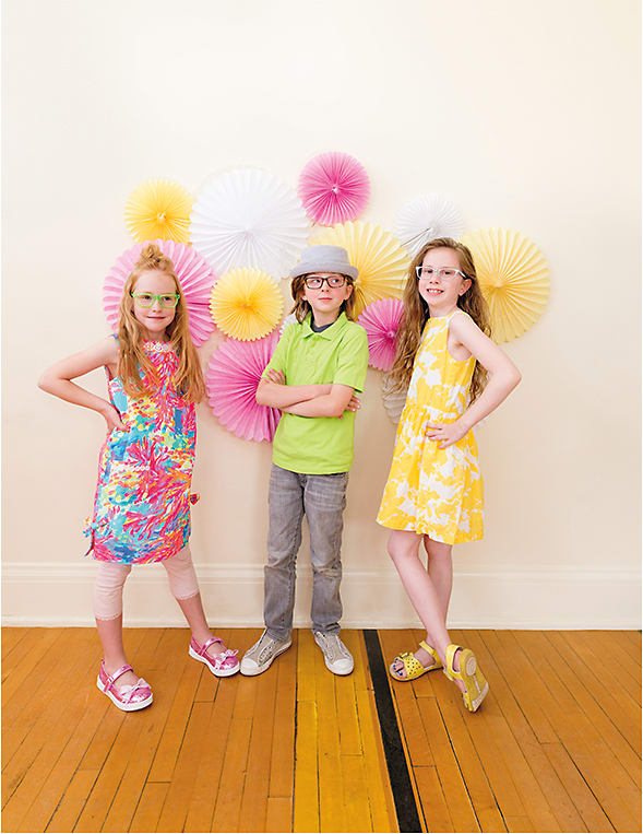 NEON DREAMING
(From left)
On Izzy: gx by Gwen Stefani junior's collection style GX801 in green from Tura emphasizes the brand’s pop color DNA.
On Kaizer: Sperry style Batten in tortoise/orange from L’Amy America features a 180-degree spring hinge.
On Giada: My Little Pony style Loyalty in blue from Nouveau Eyewear sparkles with jeweled temple details.