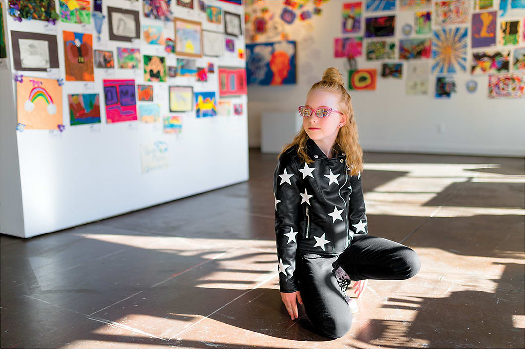 ON POINT
On Izzy: The Stella McCartney SK0050S from Kering Eyewear is an on-trend, mini-me version of a popular adult look—a statement-making cat-eye style with flash mirror lenses.