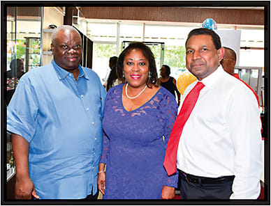 From left, U.S. Virgin Islands Gov. Kenneth Mapp, Lisa Adams-Mahepath, O.D., and Joel Mahepath, Sterling Optical USVI president/CEO