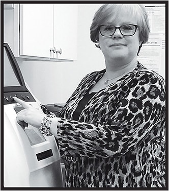 Dorothy Reynolds, L.O., takes charge of the finishing lab at Optical Alternatives in Fairfield, CT