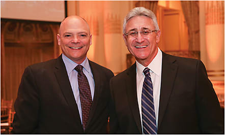 CooperVision's Jerry Warner (left) and Essilor 's Bob Colucci are honored at the SUNY Optometric Center's Eyes on NY gala at The Plaza hotel