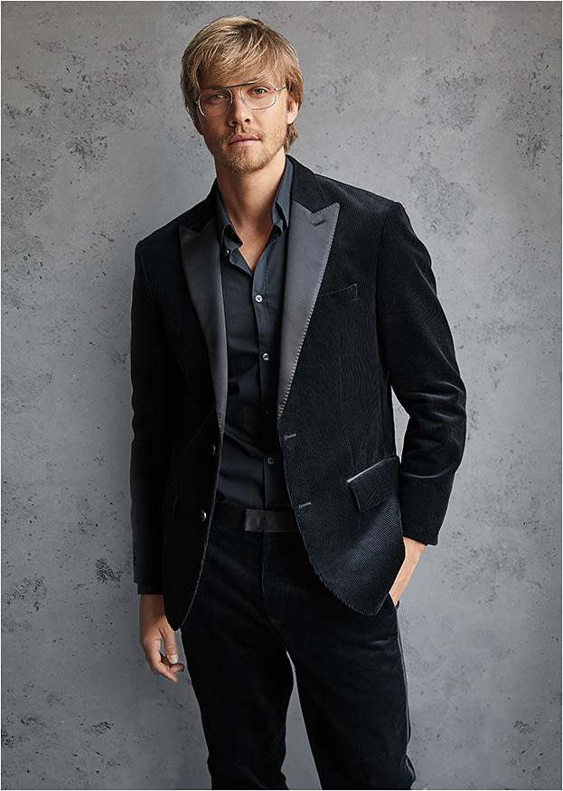 DEFINING DETAIL 
The CALVIN KLEIN CK18106 from Marchon is a modernized aviator in a matte silver thin metal punctuated with a navy blue floating brow bar.