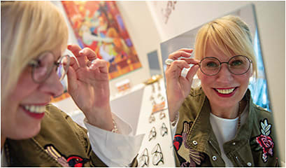 An opti attendee rocks frames from Conquistador Eyewear.