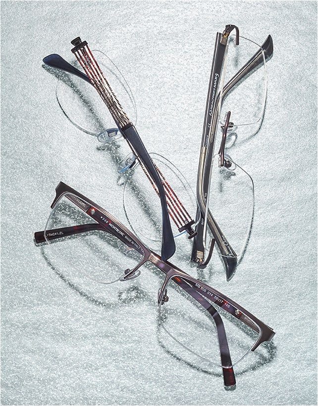 BOLD MOVES
(From left) Montblanc MB636 in color 014 from Marcolin—sophisticated rectangle semi-rimless with Havana zyl temples inset with Montblanc logo star crest. Line Art XL2081 in black from Charmant—modified oval rimless with flexible Excellence Titan patented temples in metal strands with print pattern. Realtree MAX-5 R417 in gunmetal from Nouveau Eyewear—rectangle rimless in metal with Realtree camo-printed zyl overlay on temples.