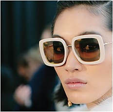 Unique, graphic lenses pop in the Elie Saab runway show in Elie Saab sunwear from Safilo.