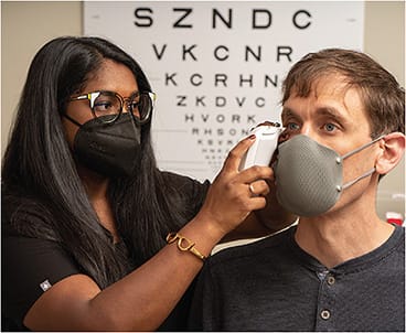 Sathi Maiti, OD, ocular surface disease clinical research fellow, uses the TearLab Osmolarity System.