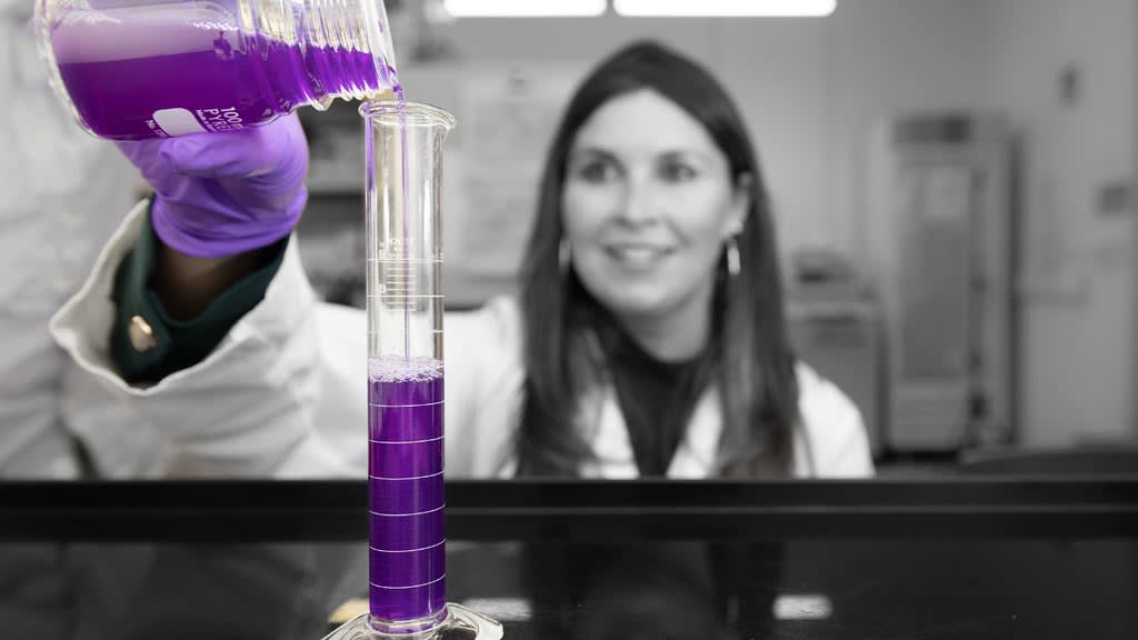 LambdaVision CEO Nicole Wagner working with bacteriorhodopsin, the purple protein used to create the company's artificial retinas. Photo Credit: Juan Patino Photography