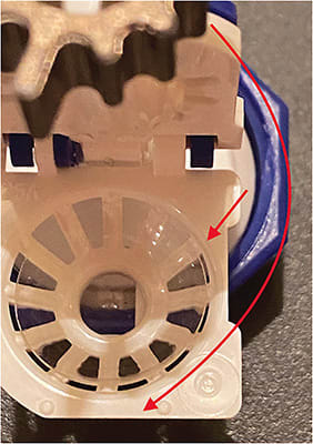 FIGURE 9. The scleral lens should be placed in the concave part. Maintaining the lens in the compartment horizontally, parallel to the plane, the vertical component of the case should be brought toward the lens and gently closed.Image courtesy of Daddi Fadel, DOptom.