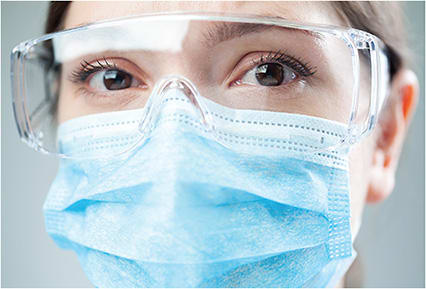 Safety precautions, including protective eye gear and face shields are prudent in preventing SARS-CoV-2 spread, specifically during exposure to infected patients.STOCK.ADOBE.COM / MILOS