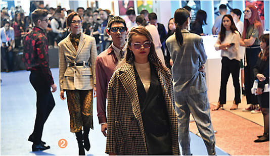 2 Several eyewear parades took place throughout the three-day show, as models sported fashion-forward specs.