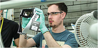 One of many quality control checkpoints during the assembly of a Smith goggle.
PHOTO: JAY DASH