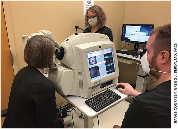 A patient undergoes an OCT screening at Dr. Berdy’s practice.