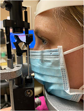 Figure 4. BYD single-use surgical mask 2311X positioned at the slit lamp.