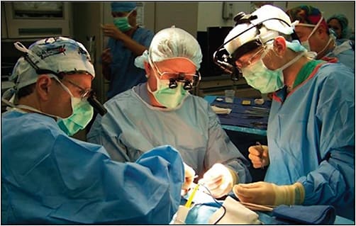 Figure 1. From left, ophthalmologists Air Force Colonel Randy Beatty, MD, Air Force Major Lisa Mihora, MD, and Air Force Colonel David Holck, MD, repair an orbital fracture at the Air Force Theater Hospital on Joint Base Balad, Iraq IMAGE COURTESY OF THE OFFICE OF THE SECRETARY OF DEFENSE PUBLIC AFFAIRS.