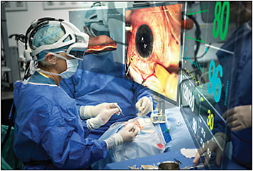 Figure 3. A surgeon using the Clarity Bionic Visualization Platform (Beyeonics; not yet commercially available), with a simulation of the visualizations projected to her view.