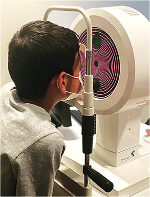 Figure 2. Using corneal topography to design and troubleshoot lenses typifies modern ortho-k practice.