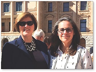 Figure 1. (right to left) Annette Hanian, OD, and Carol Alexander, OD, outside of the Arizona State Capitol in Phoenix.