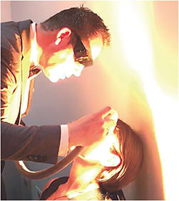 Figure 1. Dr. Kading performing an IPL treatment.